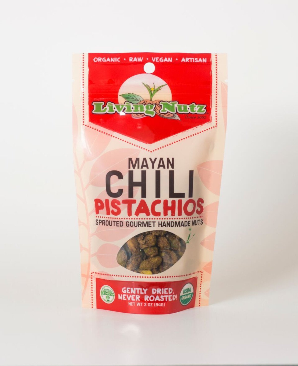 Organic raw sprouted nuts. Sprouted raw pistachios with chili seasoning. Healthy true snacking. Living nuts.